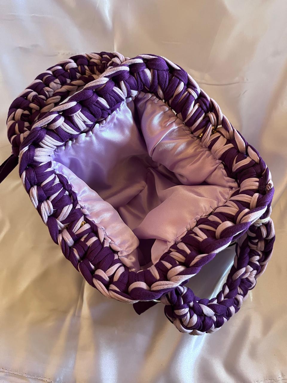 Pink and purple snap clutch