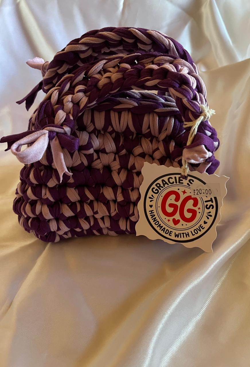 Pink and purple snap clutch